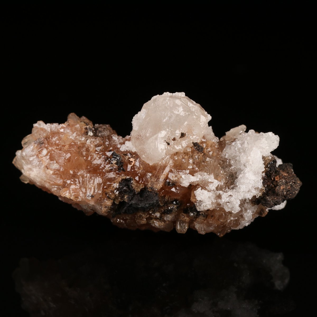Olmiite, Calcite