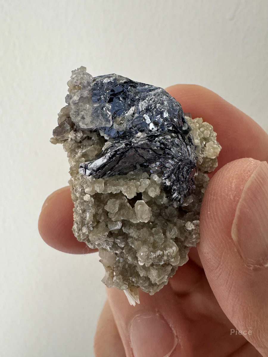 Molybdenite, Muscovite, Fluorite, Calcite