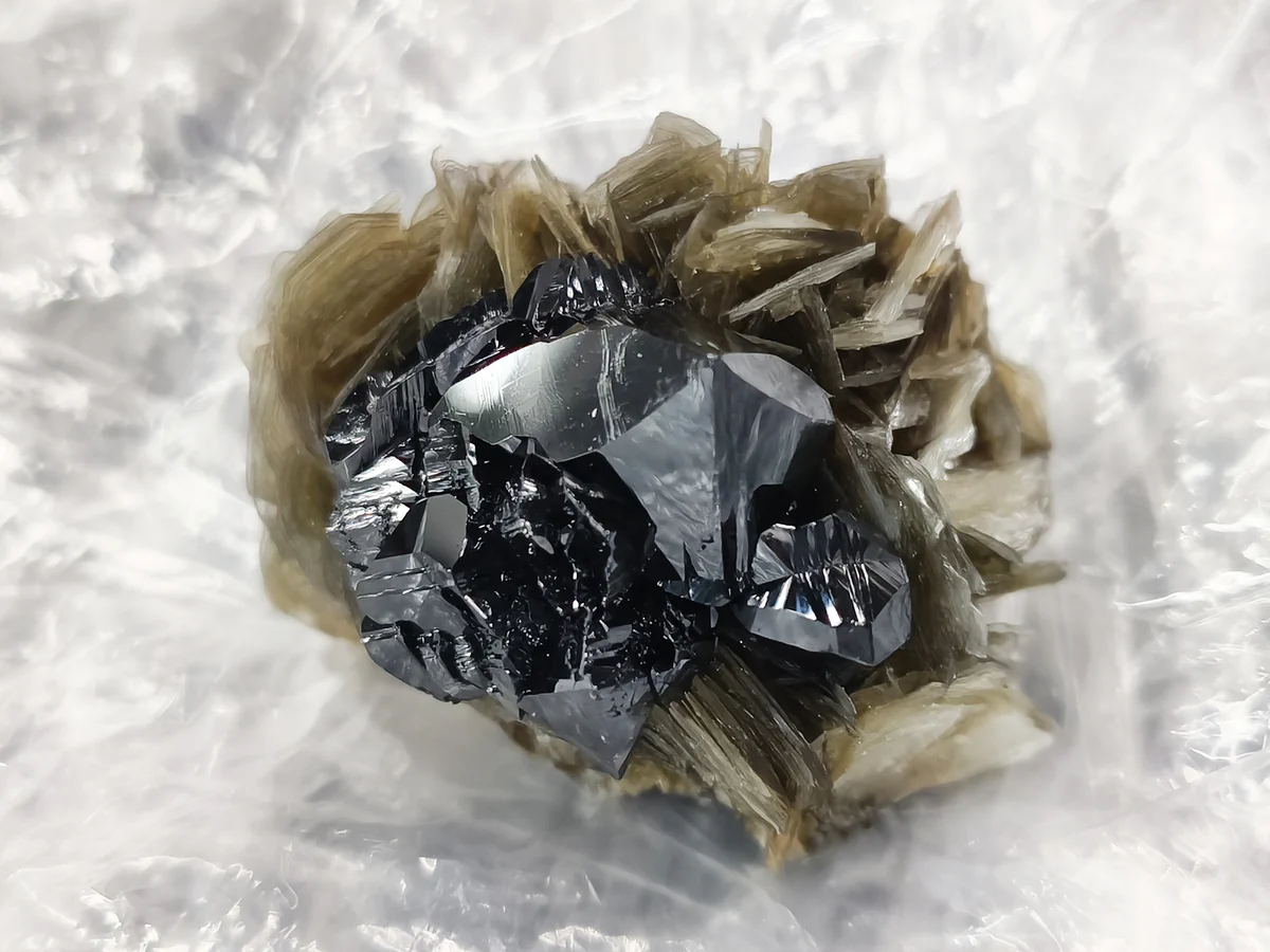 Cassiterite, Muscovite