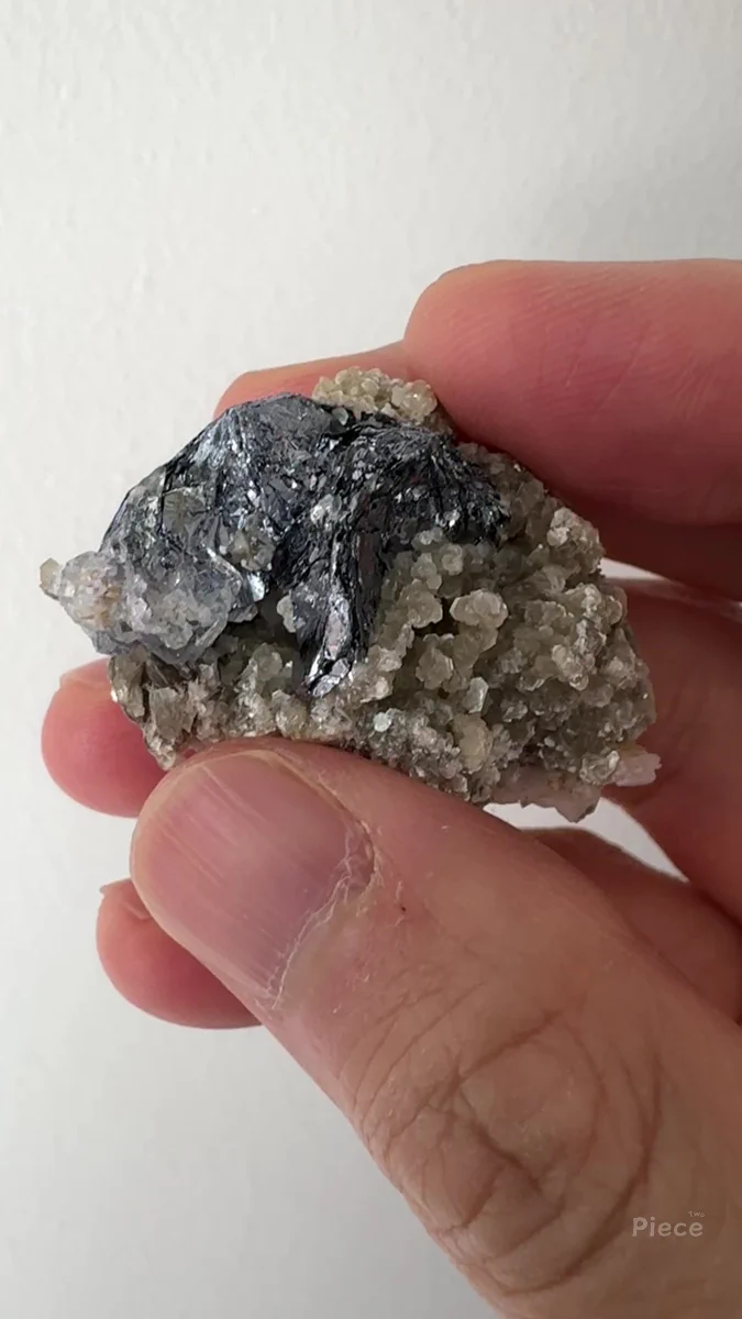 Molybdenite, Muscovite, Fluorite, Calcite